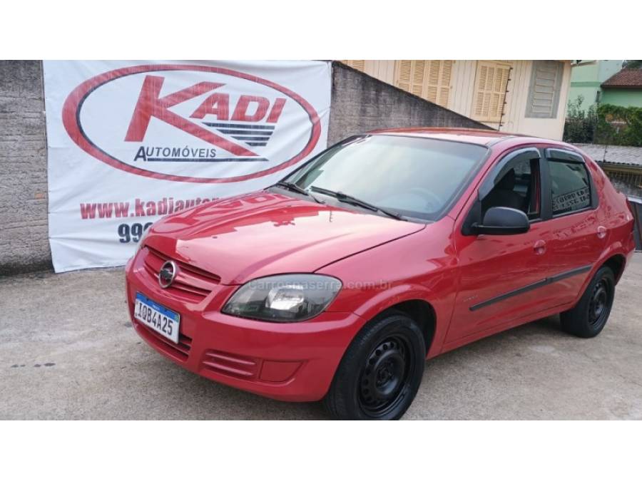 CHEVROLET - PRISMA - 2009/2010 - Vermelha - R$ 24.900,00