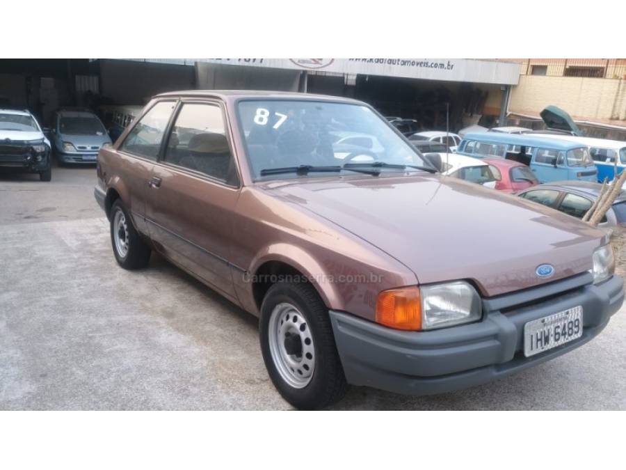 FORD - ESCORT - 1986/1987 - Marrom - R$ 19.900,00