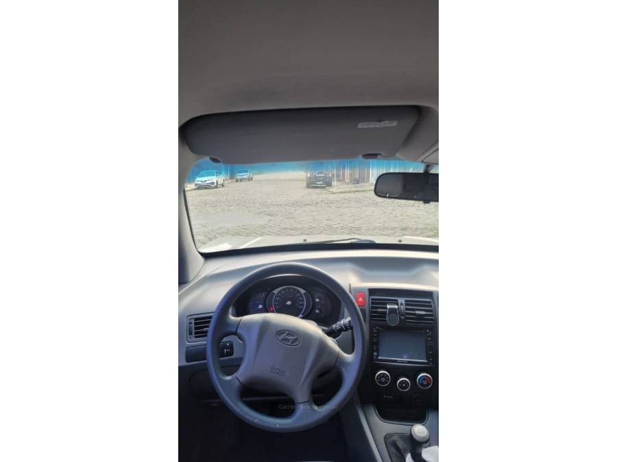 HYUNDAI - TUCSON - 2010/2011 - Bege - R$ 39.900,00